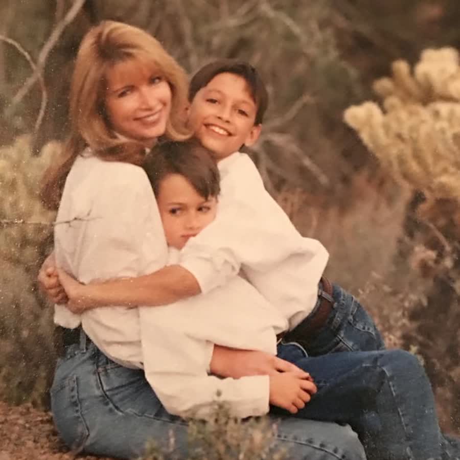 Anthony's mother with him and his brother, shortly after his father died